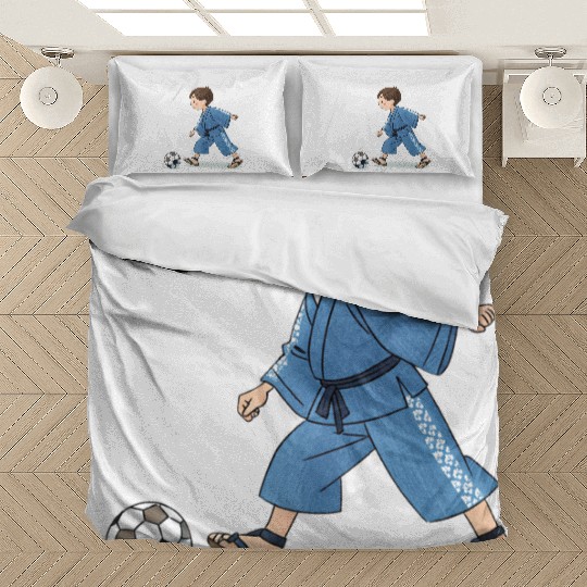 Boy in kimono playing soccer Bedding Sets