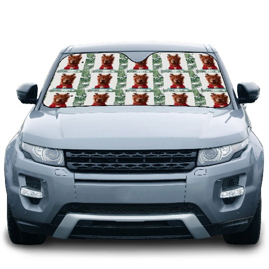 Sweet Chow Chow in a Christmas reindeer sweater. Car Sun Shades