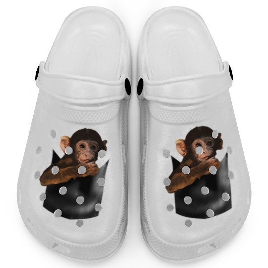 Baby Monkey In Pocket Of Monkey Clogs