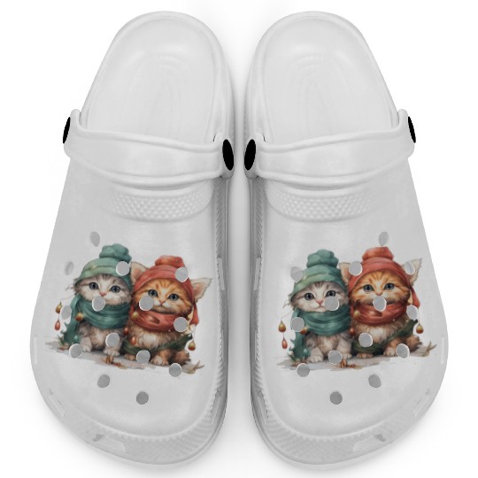 Sweet and playful Christmas kittens wearing hats Clogs