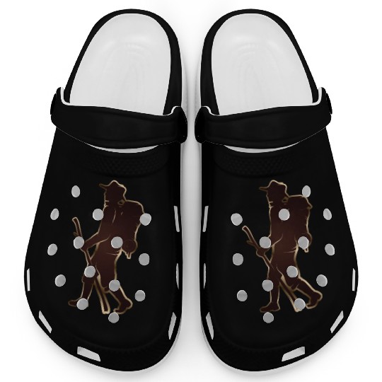 Pilgrims or hikers with walking stick & backpack Clogs