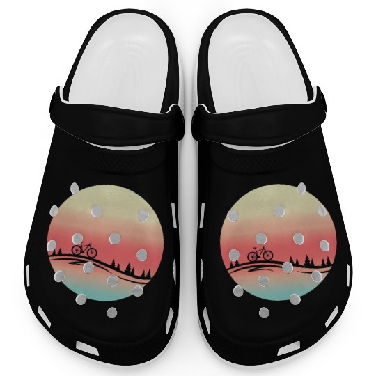 Gift idea. Bike on a sunset. Ideal for a birthday. Clogs