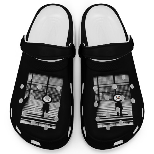 Sad Snowman in Clogs Standing on the Steps Street