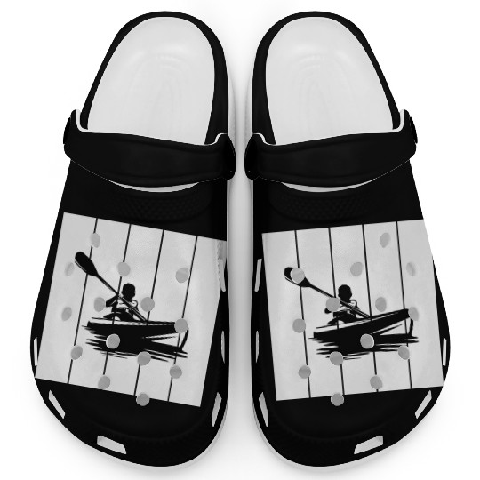 Man in a kayak boat rafting down a river Clogs