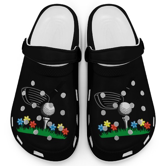 Golf stick and ball on grass field with flowers Clogs