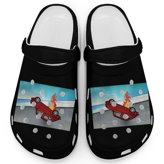 Car overturned and smashed on fire on the road Clogs