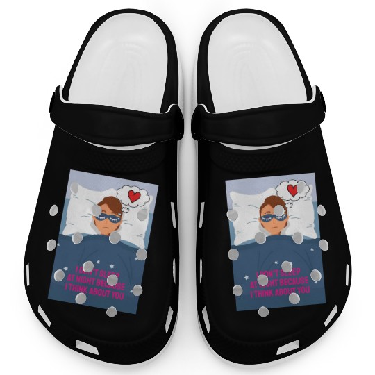 Sad woman in love lying in bed with a blindfold on Clogs