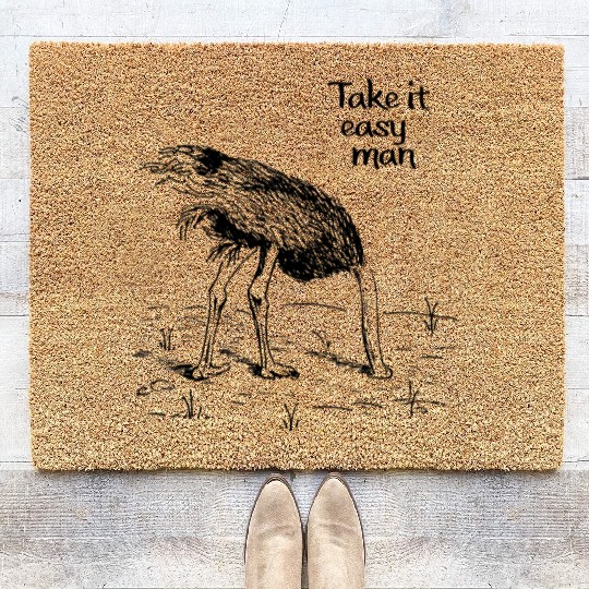 An ostrich burying its head in the sand. Relax man Coir Doormats
