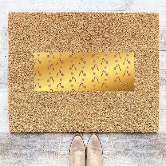 Christmas candy canes on a golden imitation backgr Coir Doormats