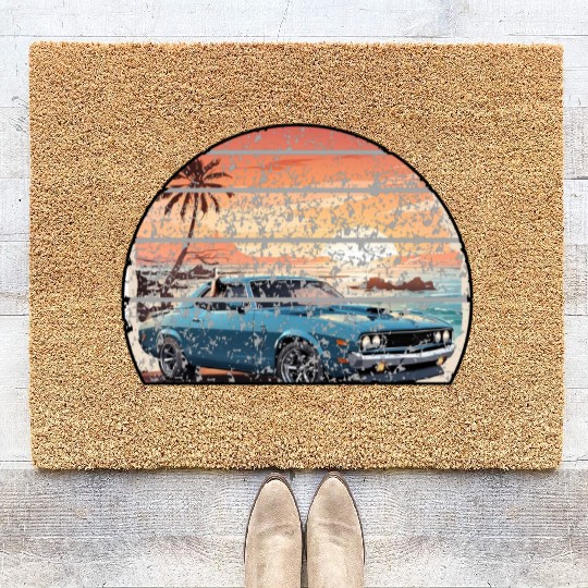 A muscle car cruisingon a coastal road. Coir Doormats