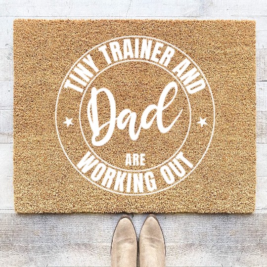 Dad and baby tiny trainer are working out in gym Coir Doormats