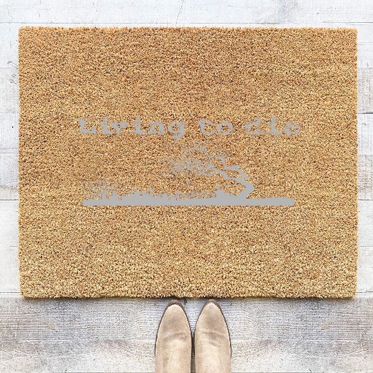 Graveyard shilouet typography Living to die Coir Doormats