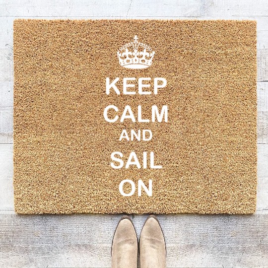 Keep calm and sail on - white text Coir Doormats
