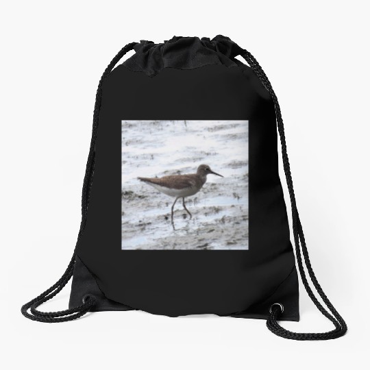 Sandpiper walking along the shore Drawstring Bags
