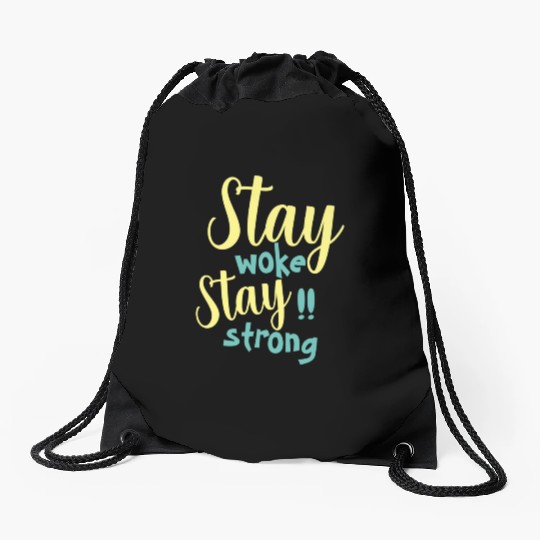 Stay woke and stay strong black fet Drawstring Bags