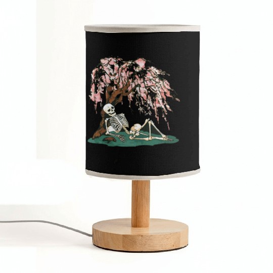 Skeleton in Repose Under a Cherry Blossom Tree Fabric Lamps