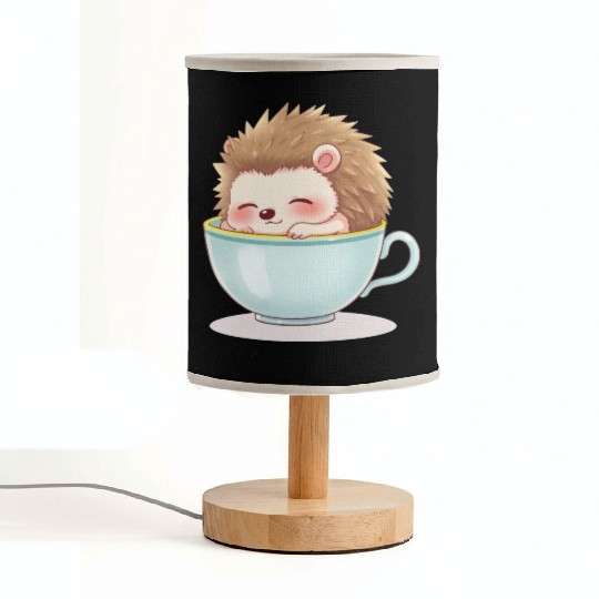 Cute hedgehog relaxing in a light blue cup Fabric Lamps