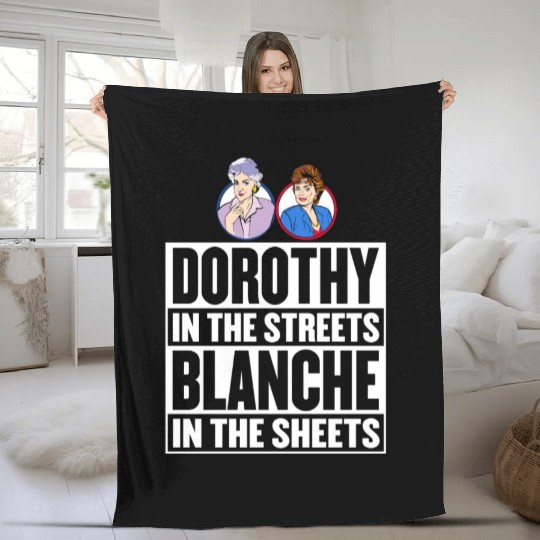Dorothy in the street blanche in the sheet Fleece Blankets