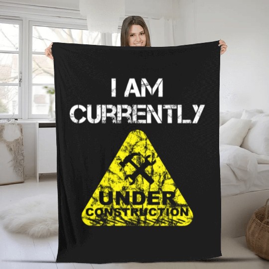 I am Currently Under Construction Fleece Blankets