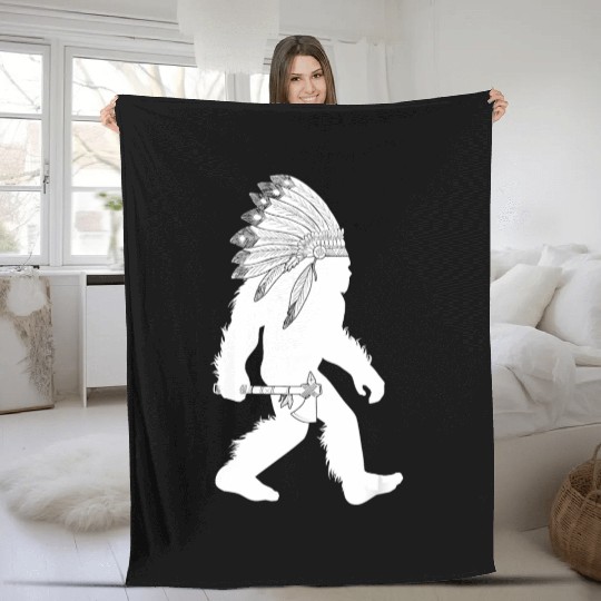 native american bigfoot wearing head holding Fleece Blankets