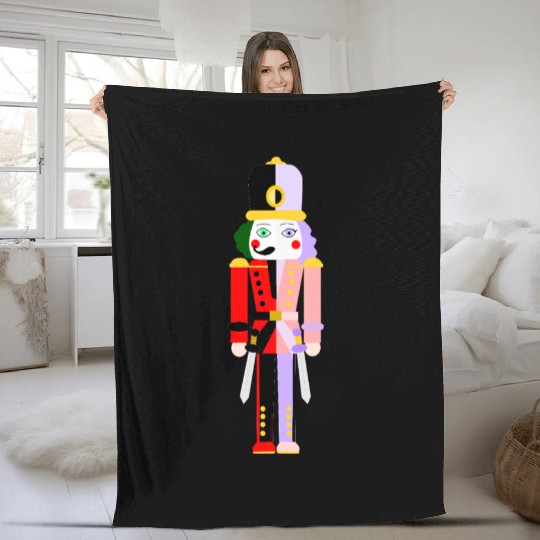 CARNIVAL CHRISTMAS: THE TWO SIDED NUTCRACKER Fleece Blankets