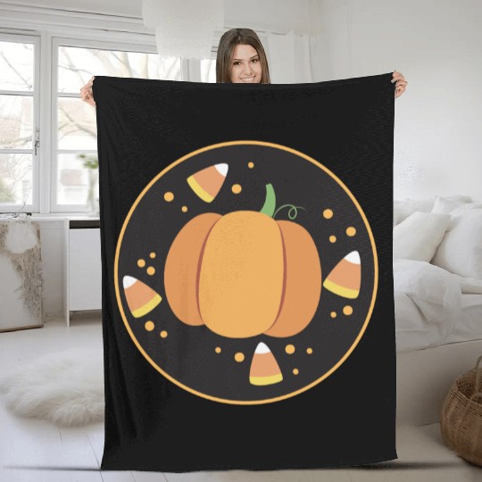 Pumkpin on a circle with candy corn Fleece Blankets