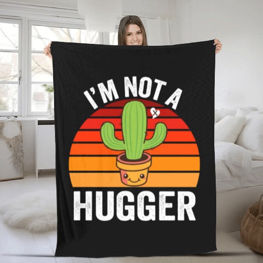 I Am Not A Hugger Fleece Blankets