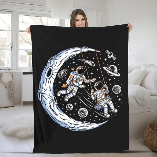 Astronauts on swing on moon Fleece Blankets