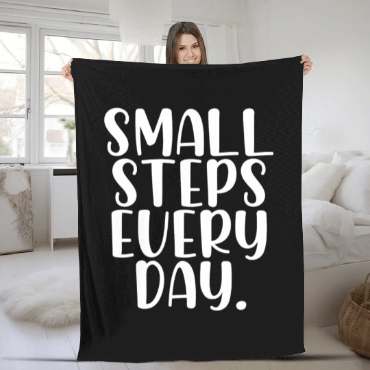 Small steps every day Fleece Blankets