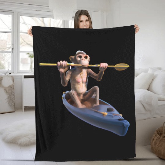 Monkey in a kayak Fleece Blankets