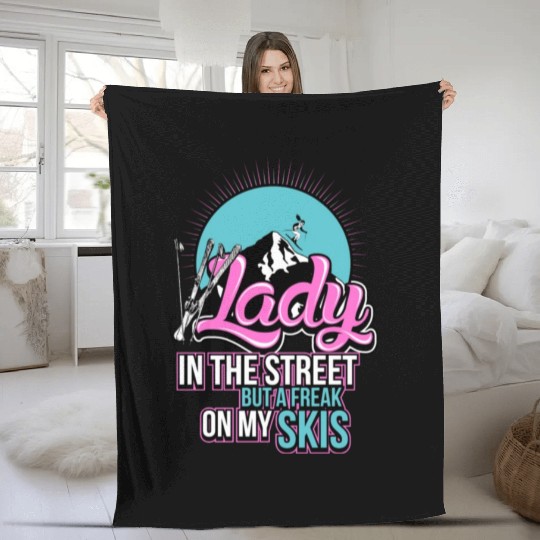 Skiing Lady in the street but a freak on my skis Fleece Blankets