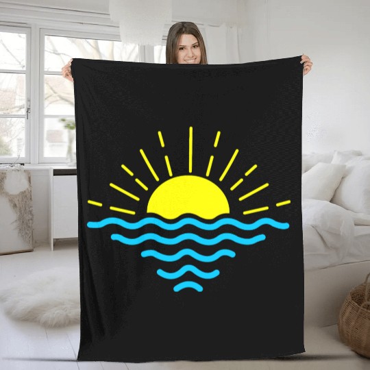 Sunset below blue waves of the sea Fleece Blankets