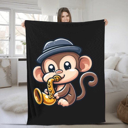 Chimpanzee with saxophone Fleece Blankets