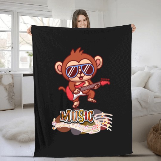 Monkey playing guitar Fleece Blankets
