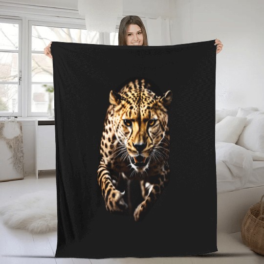 A Cheetah in Motion Fleece Blankets