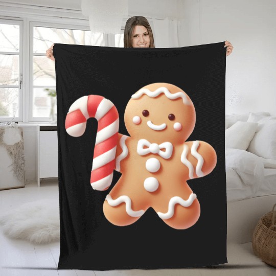 Happy gingerbread man with candy cane Fleece Blankets