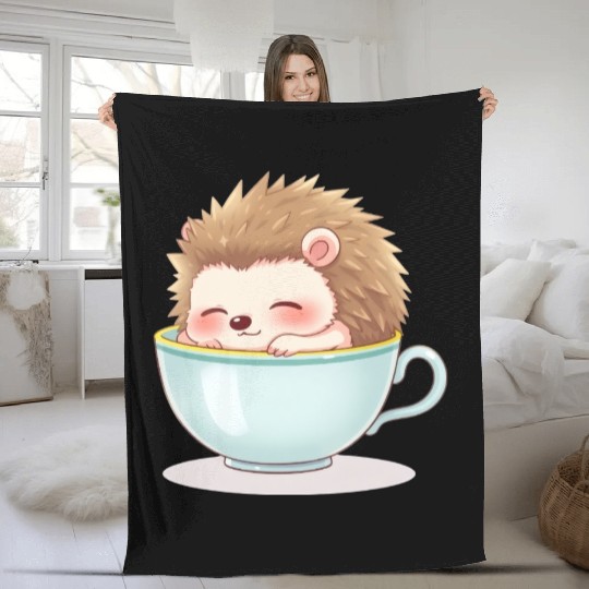 Cute hedgehog relaxing in a light blue cup Fleece Blankets