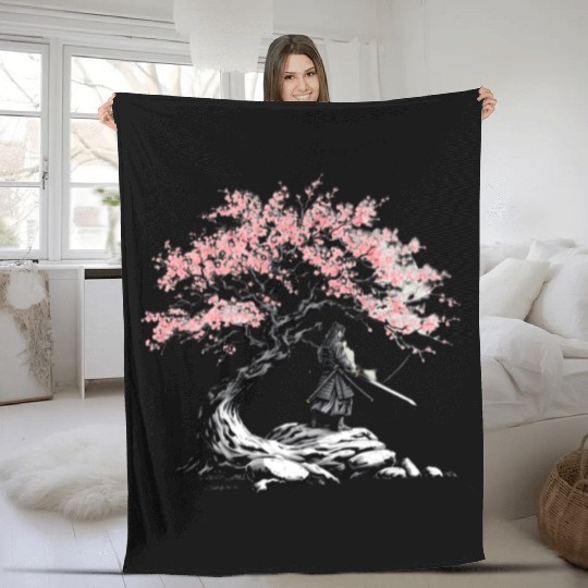 Samurai trains beneath a blooming Sakura tree Fleece Blankets