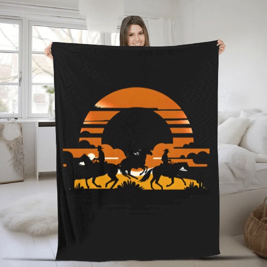 Western Riders at Sunset Fleece Blankets