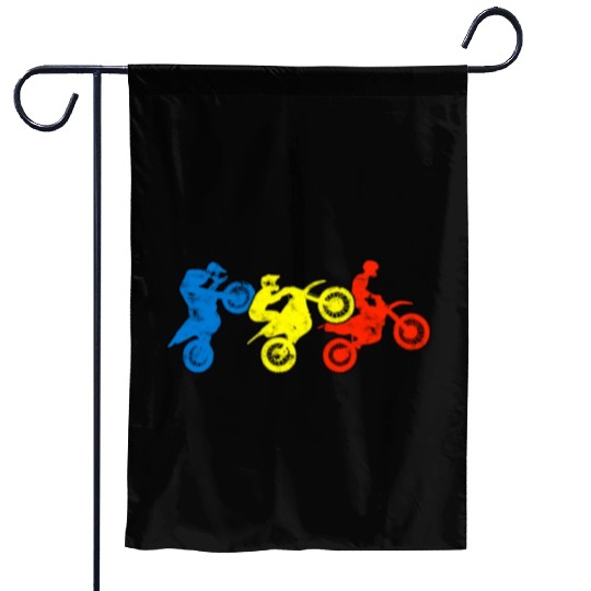 Silhouette of three man riding a motorcycle with Garden Flags