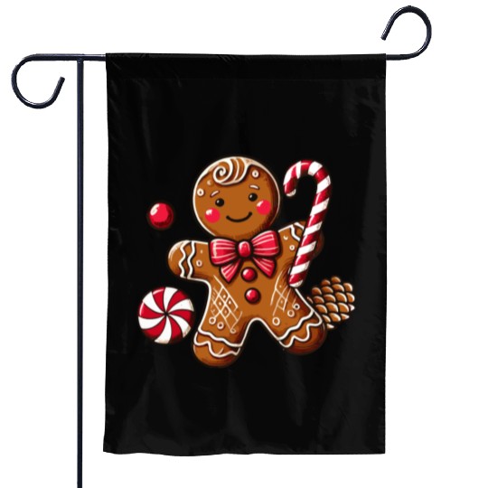 Happy gingerbread man with candy cane Garden Flags