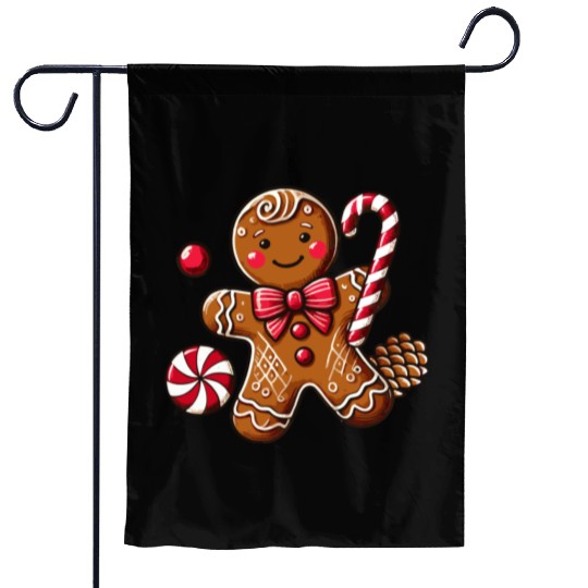 Happy gingerbread man with candy cane Garden Flags