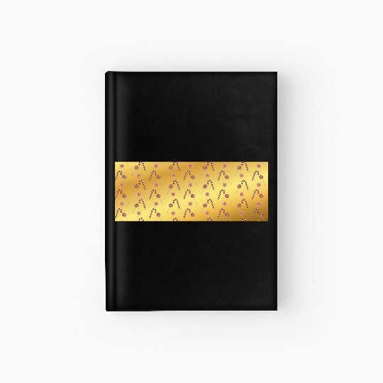Christmas candy canes on a golden imitation backgr Hardcover Journal
