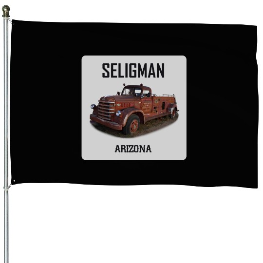 Old car city of Seligman in Arizonna, US Route 66 House Flags