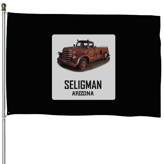 Old car city of Seligman in Arizonna, US Route 66 House Flags