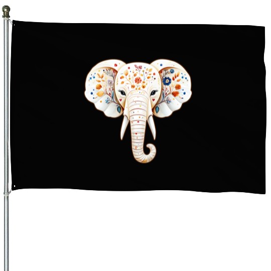 A white elephant adorned with a vivid and vibrant House Flags