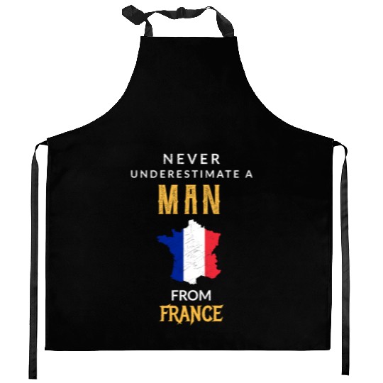 Never underestimate a man from france! Kitchen Aprons