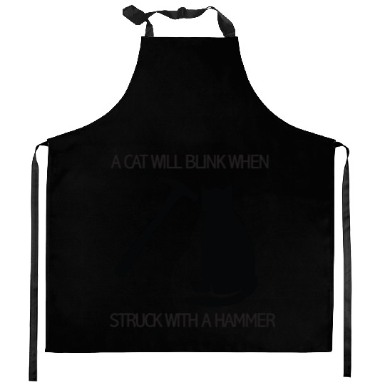 A CAT WILL BLINK WHEN STRUCK WITH A HAMMER Kitchen Aprons