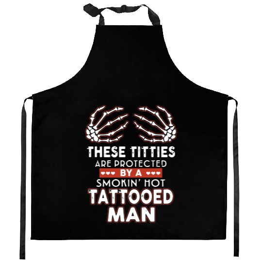 there titties are protected by a smoking hot tatto Kitchen Aprons
