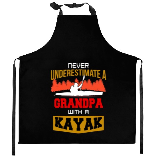 Never Underestimate a grandpa with a kayak Kitchen Aprons